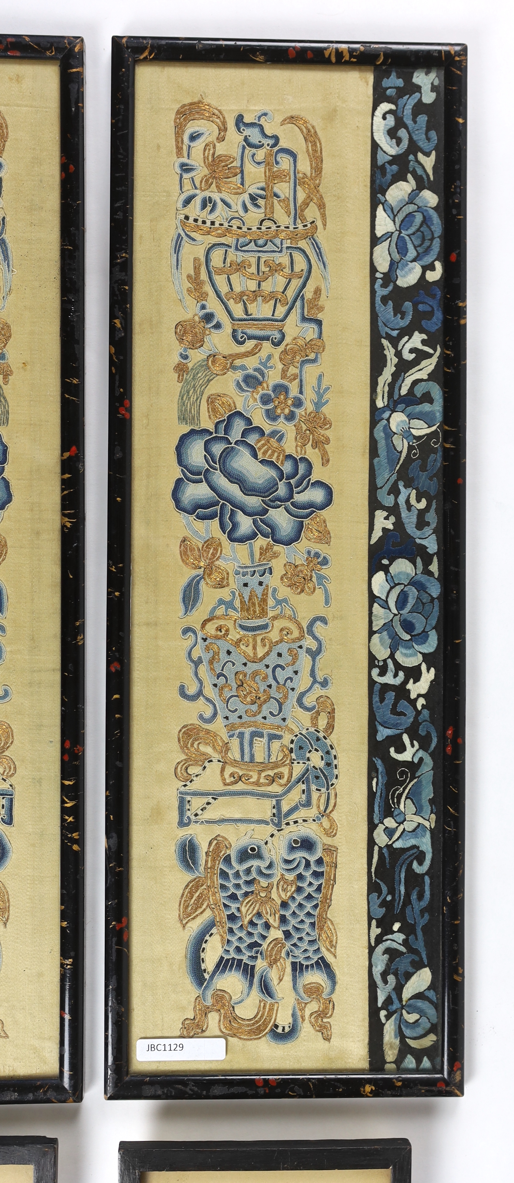 Two pairs of 19th century framed Chinese silk embroidered sleeves bands, one pair embroidered in fine silk petit point on a muslin ground, designed with four roundel scenes on a stylised brick designed background, the ot